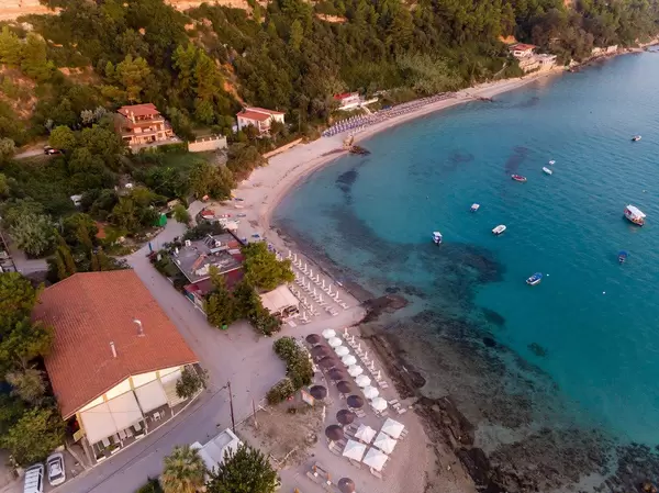Aerial shot of the beach in Afitos at sunset