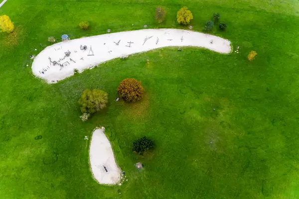 Aerial view of a german adventure playground in the green park of colognes botanical garden