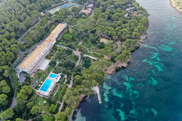 Aerial view of luxury hotel Formentor with pool at Cala Pi de la Posada, Port de Pollença, Majorca
