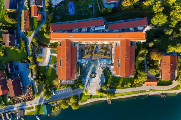 Aerial view of the Althoff Seehotel Überfahrt on the shores of Tegernsee. 5-star superior wellness hotel