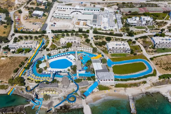Aerial view of the Aqua Paros water park in Naoussa, Greece, With water slides into the Mediterranean Sea
