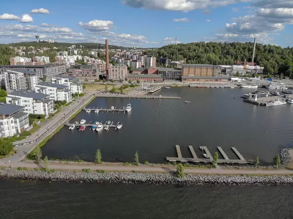 Aerial view of the harbour district in Lahti, with motorboats and yachts on Lake Vesijärvi, next to triathlon course of the Ironman 70.3 in Finland