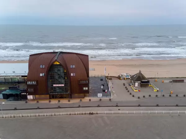 Aerial view over beach in Bloemendaal aan Zee with beach hotel Proeflokaal Bregje