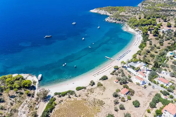 Aerial view shows sport boats near the Agioi Anárgyroi Beach, on the Greek island Spetses in the Argolic Gulf
