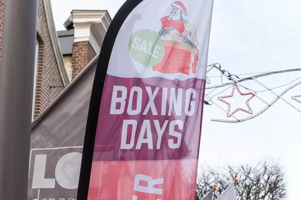 After Christmas shopping: flag in front of a store with text "Sales - Boxing Days"