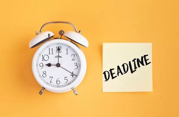 Alarm clock with handwritten text Deadline