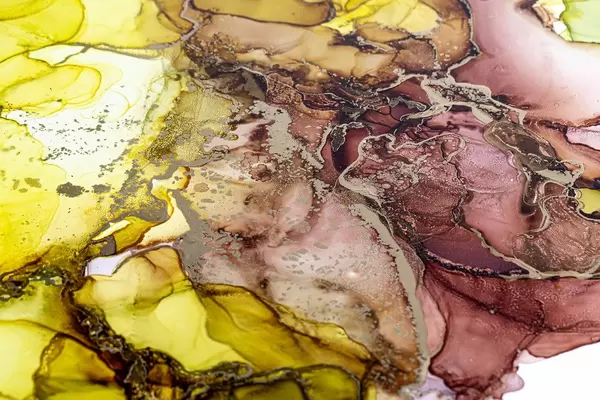 Alcohol ink brown, green, yellow, and gold mix colors