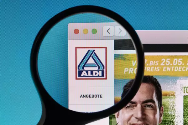 Aldi logo under magnifying glass