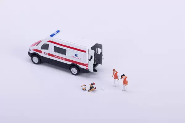 Ambulance and injured soccer player