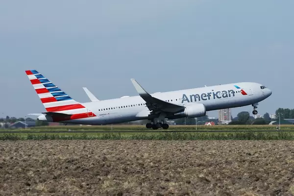American Airlines plane takes off from Amsterdam Airport