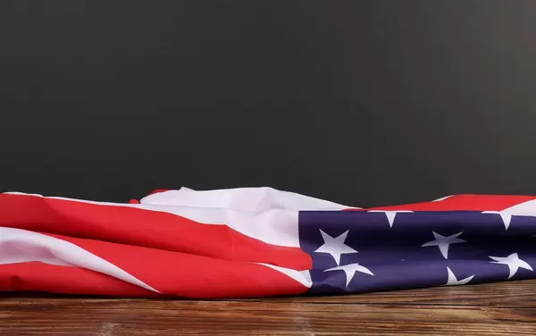American flag on wooden table