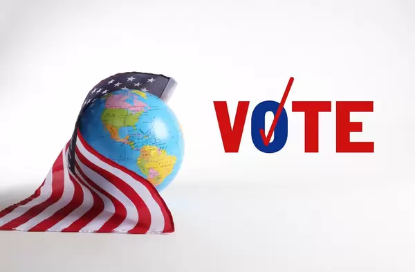American flag with globe and Vote text