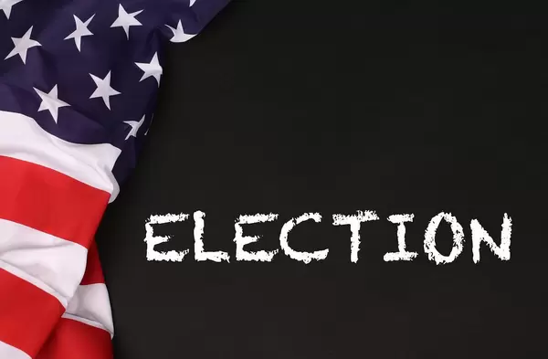 American flag with the text Election against a blackboard background.jpg