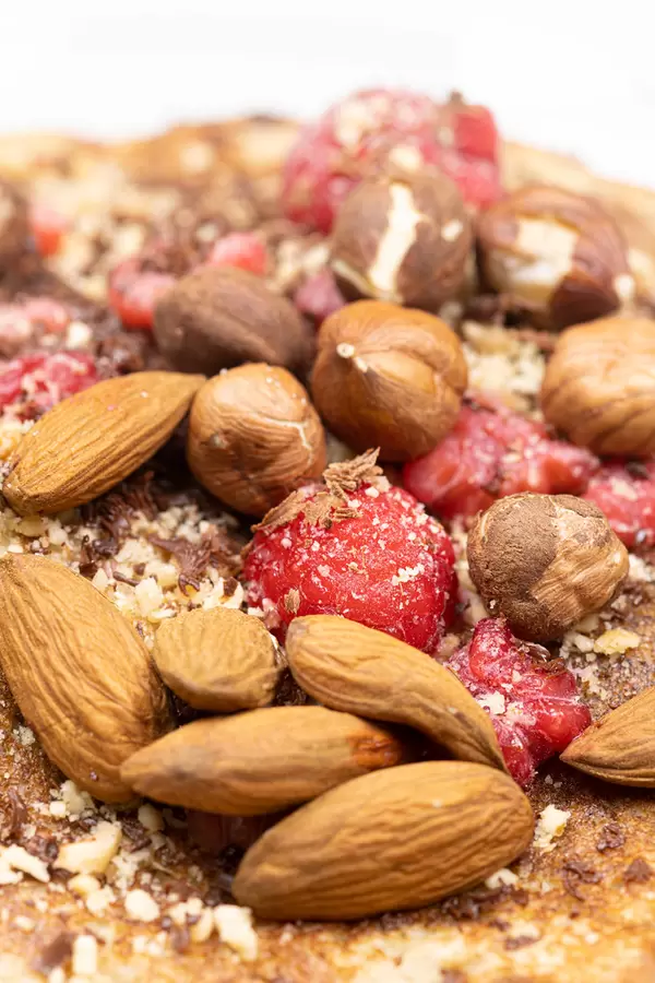 American Pancakes with almonds raspberries and dark chocolate