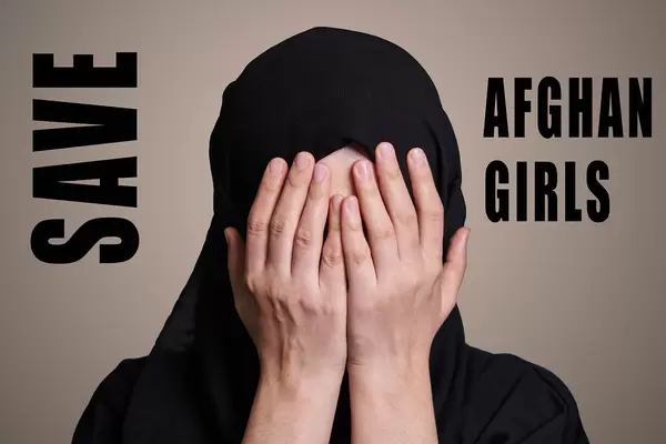 An afghan woman wearing traditional Islamic clothing hijab and covering her face - Safe afghan girls