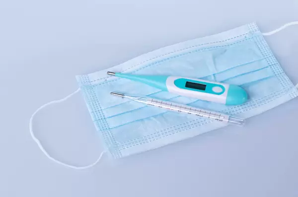 Analog and digital thermometer with medical face mask