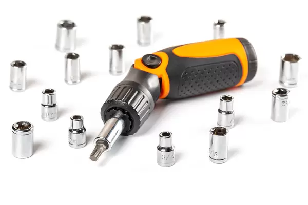 Angle screwdriver with heads on white background