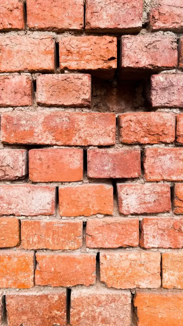 Another missing brick in the wall