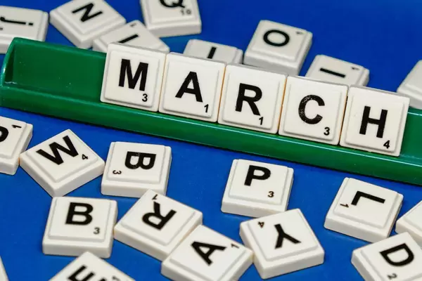 Another shot of March text on blue background