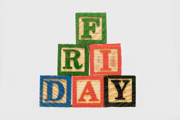 Another shot of wooden blocks with Friday text