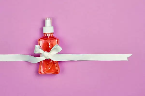 Antiseptic gel bottle decorated with ribbon