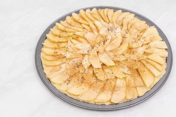 Apple Pie prepared for baking in the round tray