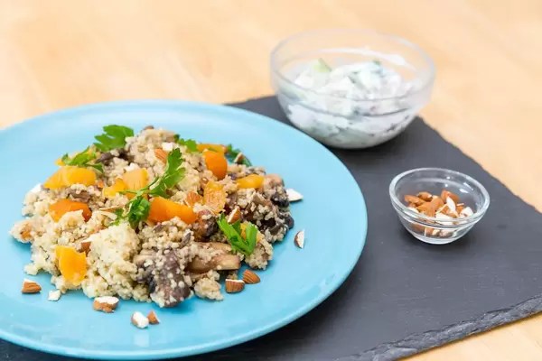 Apricot couscous with Ras-el-Hanout mushrooms, almonds and cucumber yogurt dip