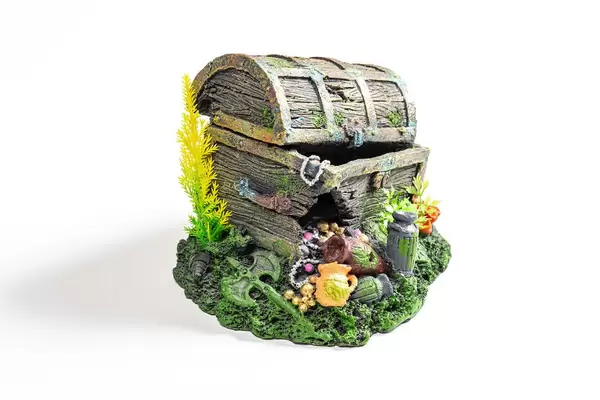 Aquarium decor made from open old chest with treasures