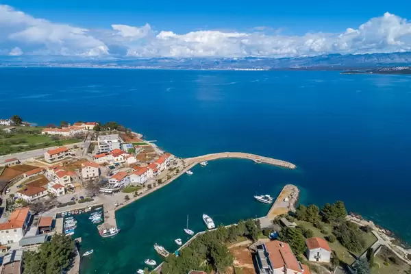 Ariel view of small harbour and village