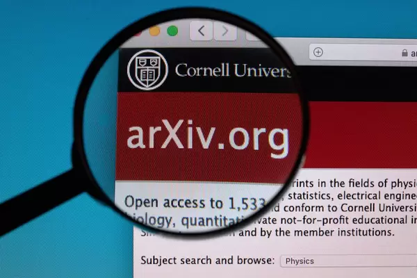 arXiv.org logo under magnifying glass