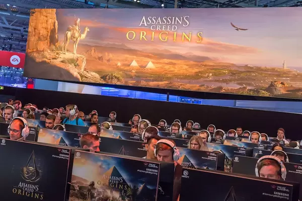 Assassins Creed Origins gamer in a fair hall