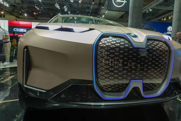 Assistend and highly autonomous driving with cameras and sensors behind kidney-shaped illuminated grilles of BMW Vision iNext