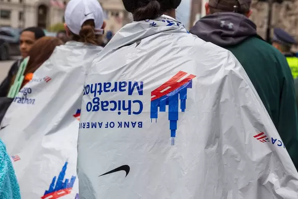 Athletes wrapped in tin foil / heat sheets after finishing Chicago Marathon race