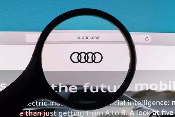 Audi logo under magnifying glass