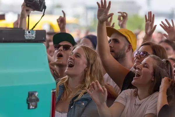 Audience singing along during a concert