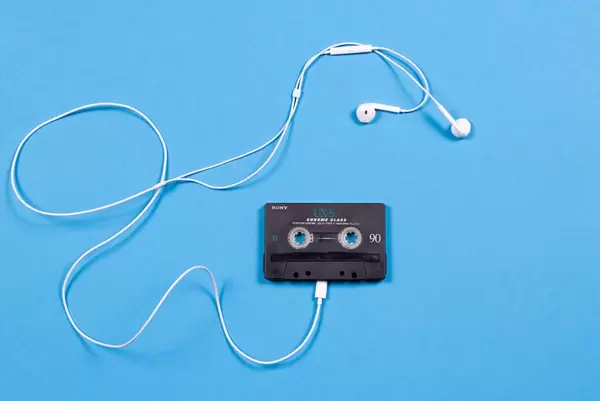 Audio cassette with headphones