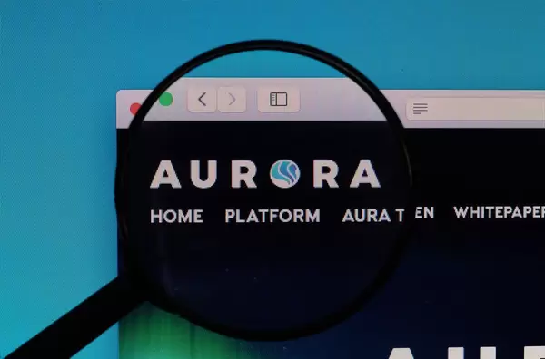 Aurora logo under magnifying glass