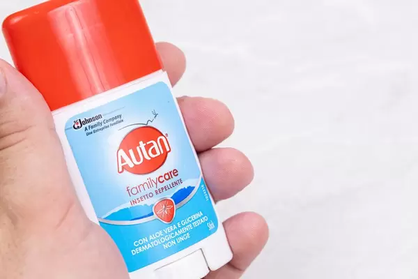 Autan Mosquito stick in the hand with copy space