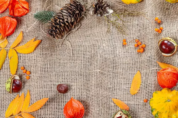 Autumn frame on burlap with free space. Concept Halloween, thanksgiving, autumn holidays (Flip 2019)