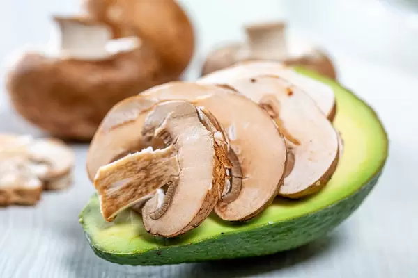 Avocado stuffed with mushrooms