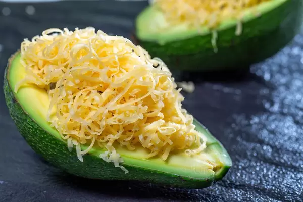 Avocado with cheese filling close-up (Flip 2019)