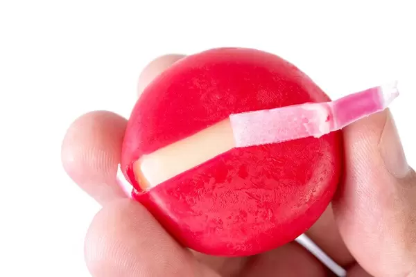 Babybel cheese in the hand (Flip 2019)