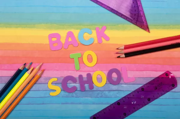Back to School text on colorful background
