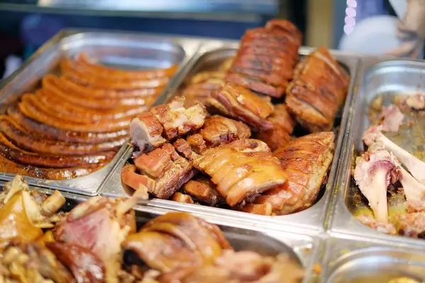 Bacon rolls and meat products, street food (Flip 2019)