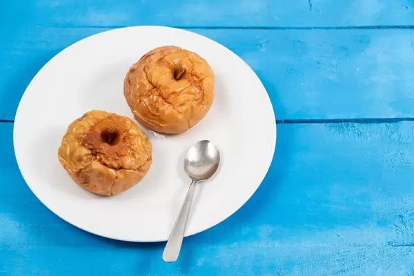 Baked Apples with spoon on the plate (Flip 2020)