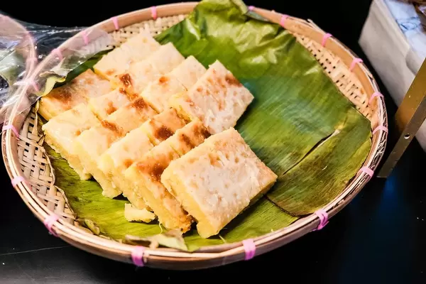 Baked cassava cake on weaved basket