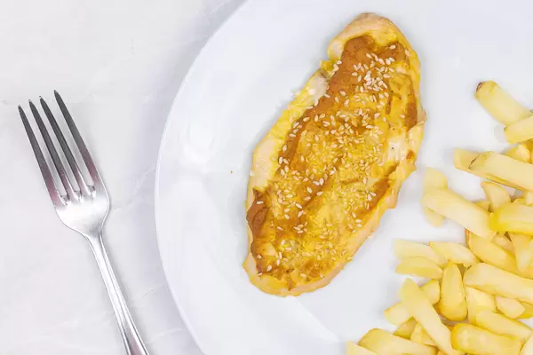Baked Chicken Meat coated with mustard and sesame