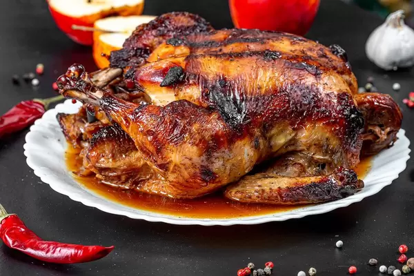 Baked chicken stuffed with apples with spices, chili and fresh apples (Flip 2019)