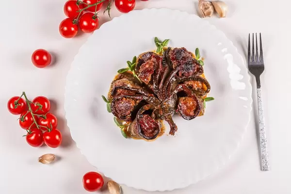 Baked eggplant stuffed with minced meat and tomato sauce