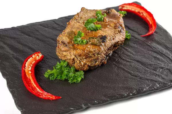 Baked meat with fresh chili pepper